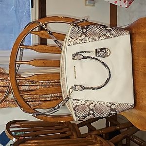 Michael Kors large all leather snake skin purse.
